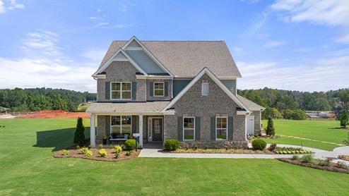 Exterior two-story home with stone detaiing