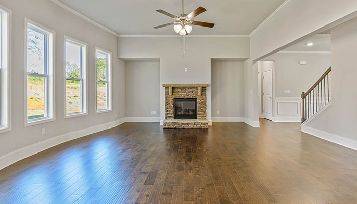 Interior living area with large windows and fire place