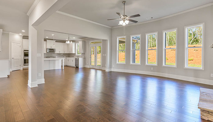 Interior living area with large windows and fire place