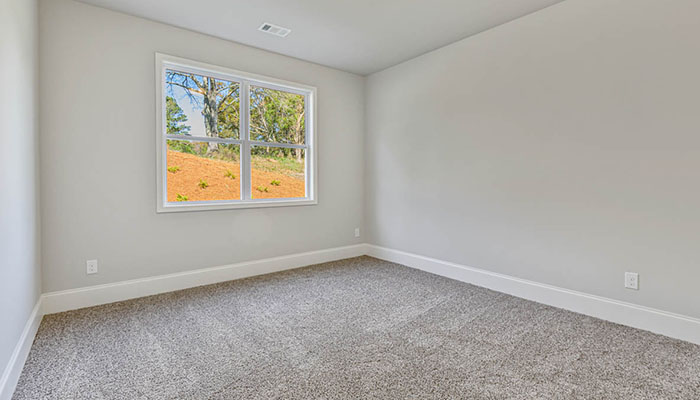 Interior bedroom with large window