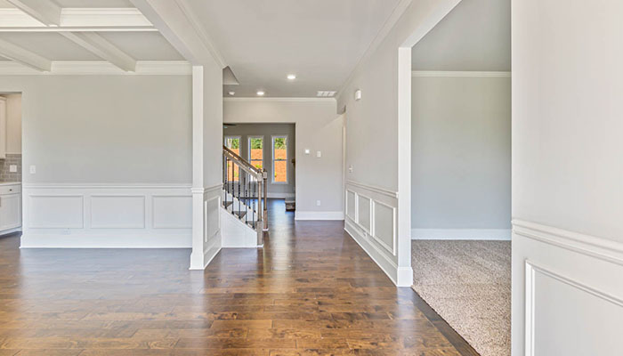 Interior entry-way leading to living area and staircase