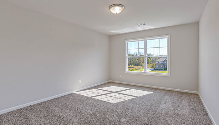 Interior bedroom with large window