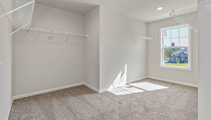 Interior primary walk-in closet