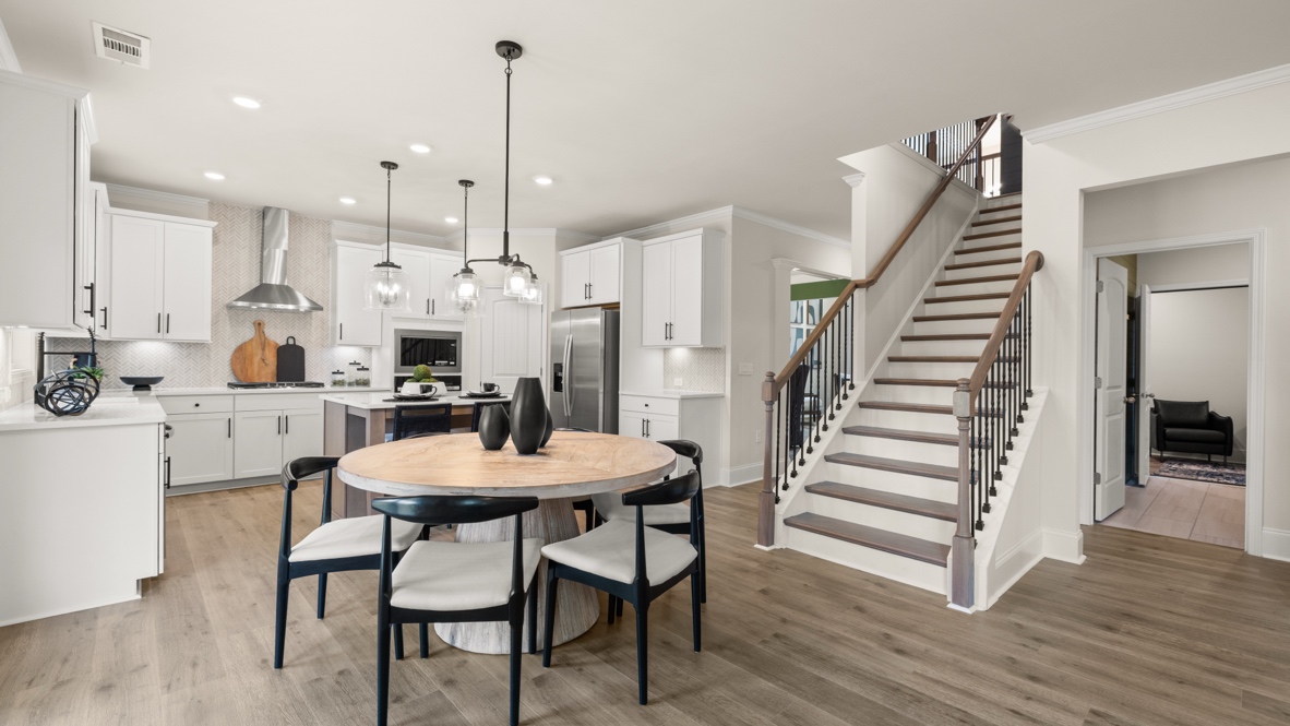 Interior dining area open to staircase