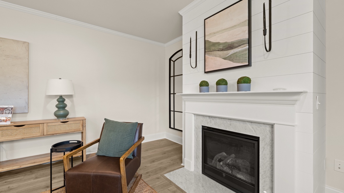 Interior living area with large windows and fire place