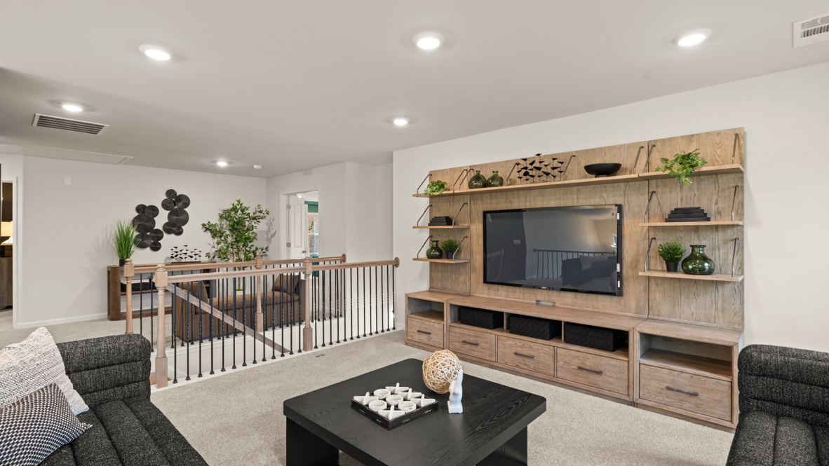 Interior upstairs loft area open to staircase