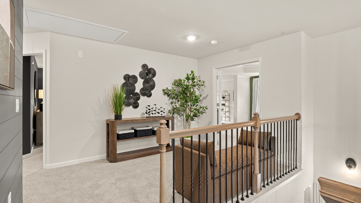 Interior upstairs loft area open to staircase