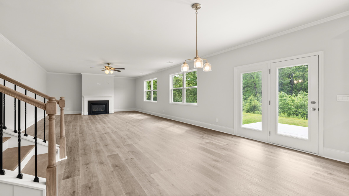 Interior living area with fire place and large windows