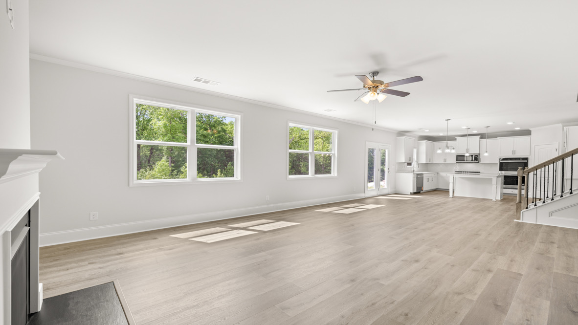 Interior living area with fire place and large windows