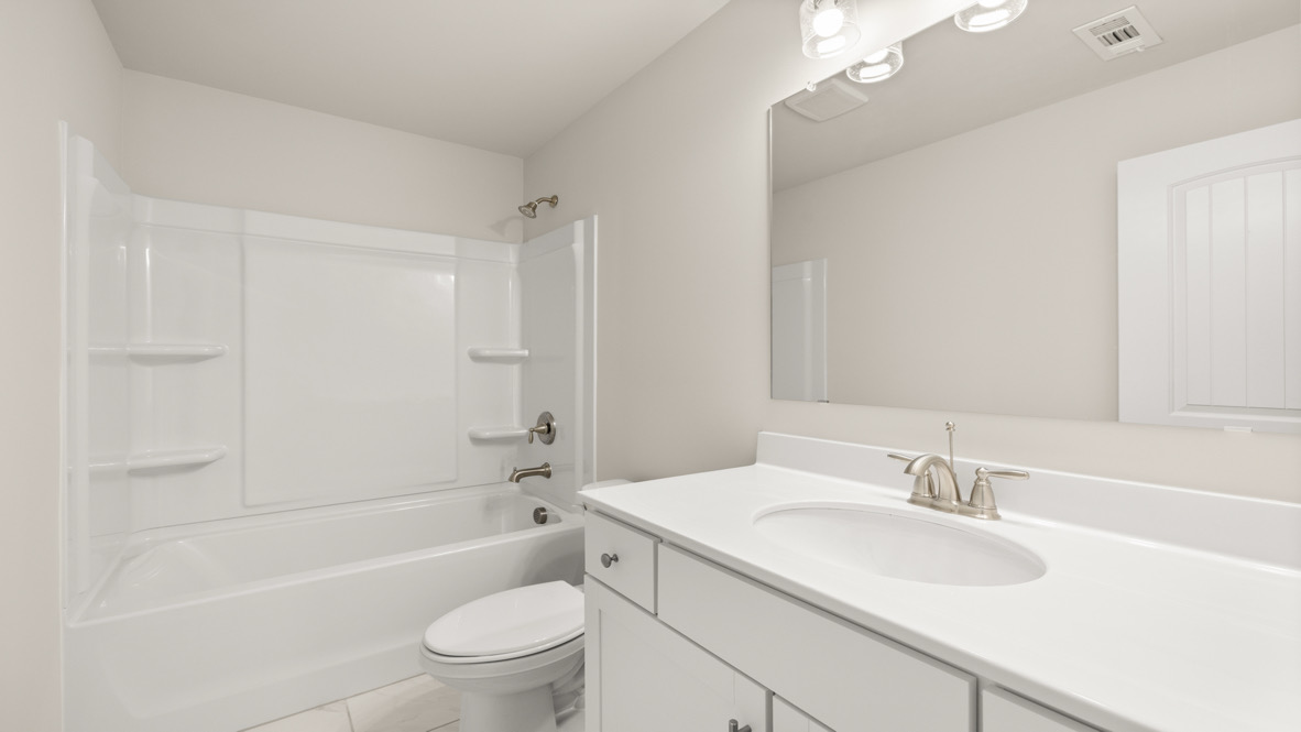 Interior bathroom with sink and full-sized shower