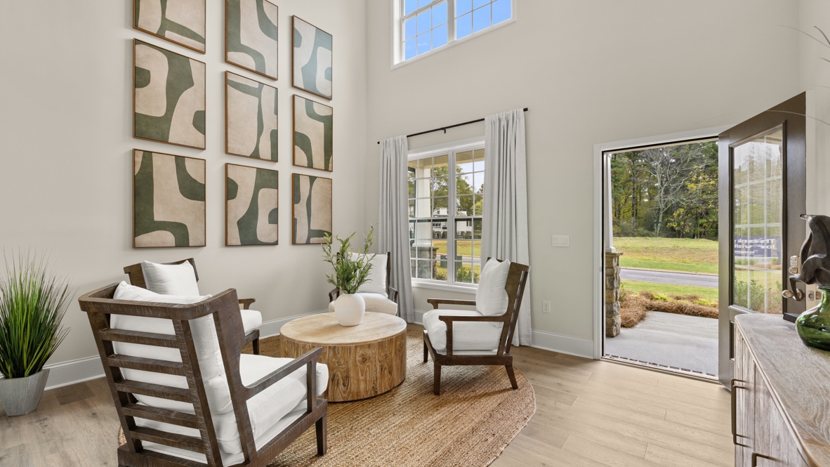 Interior flex area with large window and next to entry-way