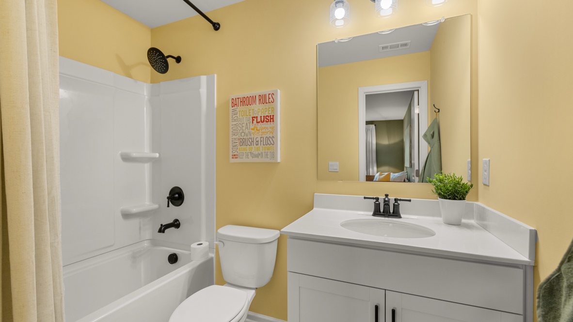 Interior bathroom with sink and full-sized shower