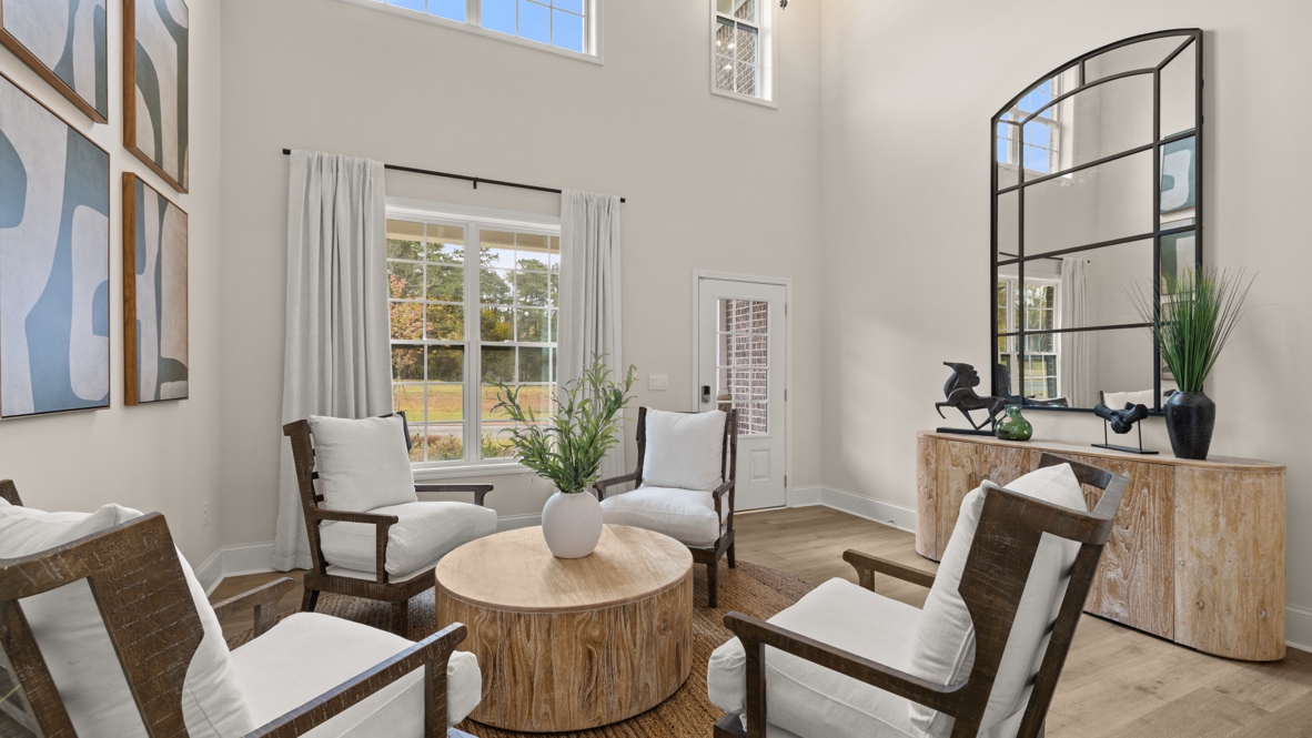 Interior flex area with large window next to entry-way