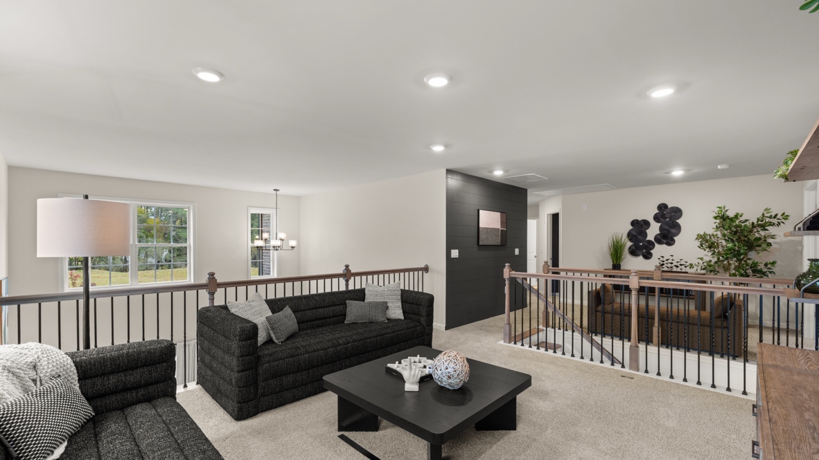 Interior upstairs loft area open to staircase