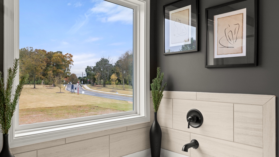 Interior primary bathroom with bath tub