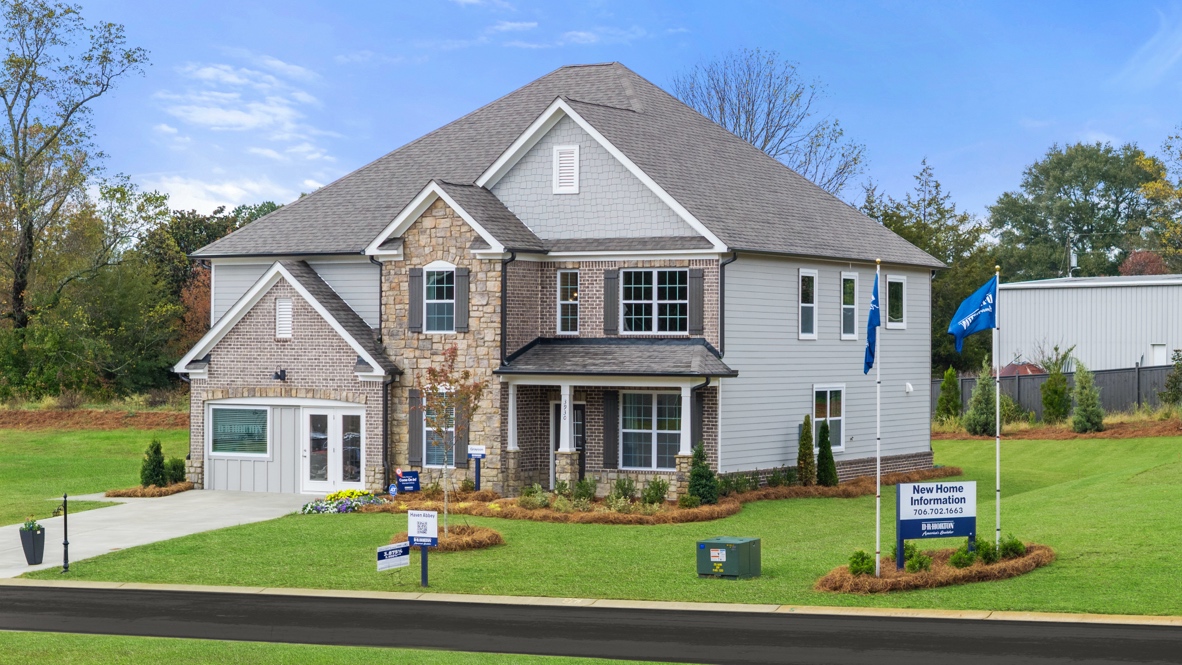 Exterior two-story home with stone detailing