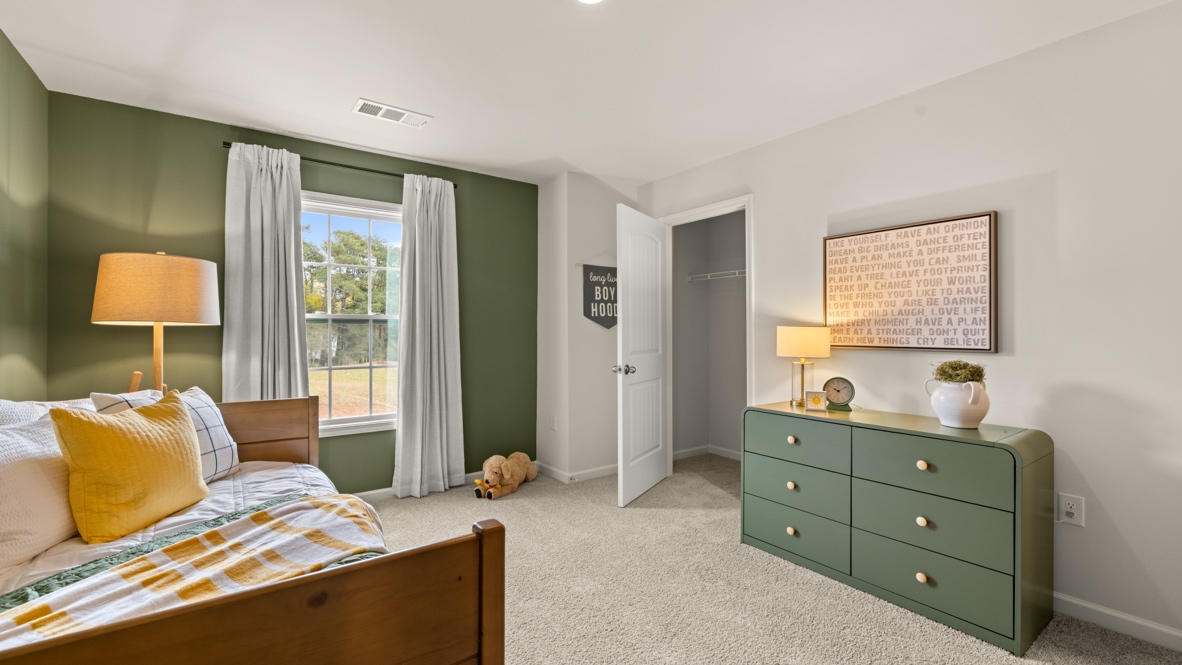Interior bedroom with window and closet