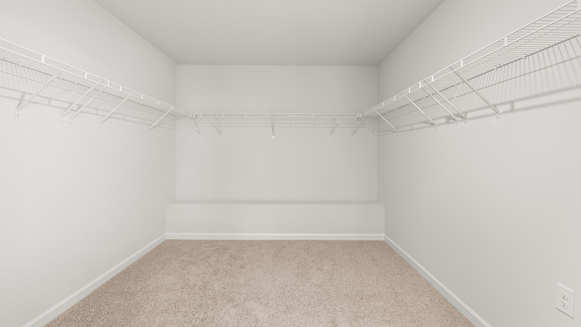 Interior primary walk-in closet