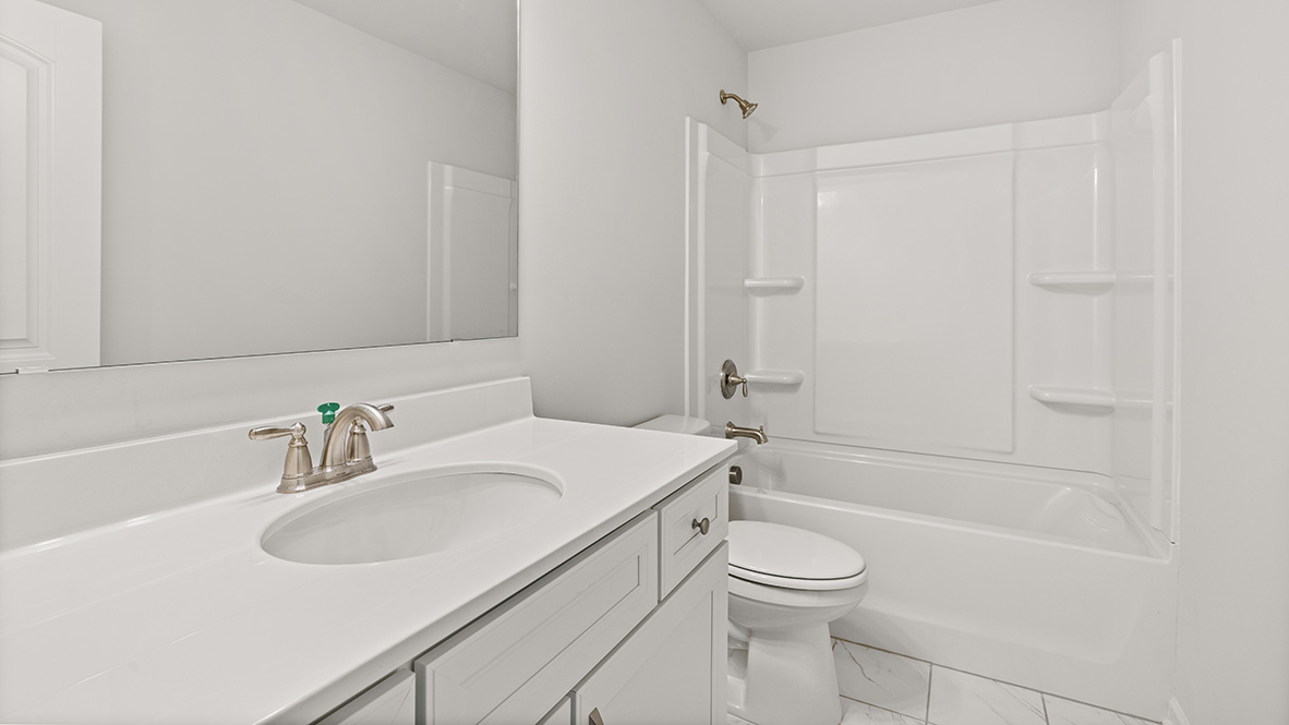 Interior bathroom with sink and full-sized shower