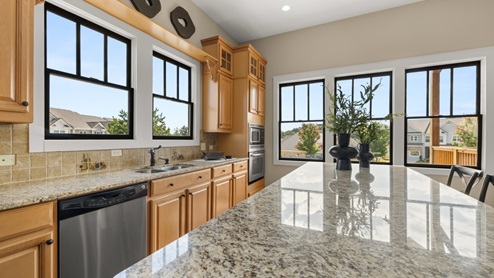 Kitchen with center island in community clubhouse