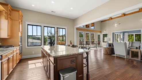 Kitchen with center island in community clubhouse