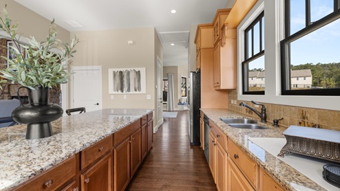 Kitchen with center island in community clubhouse