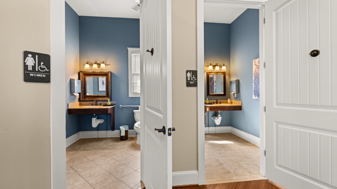 Community clubhouse hallway near bathrooms