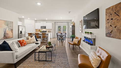 sudbury townhome living room with floating electric fireplace at mountain park in dahlonega georgia