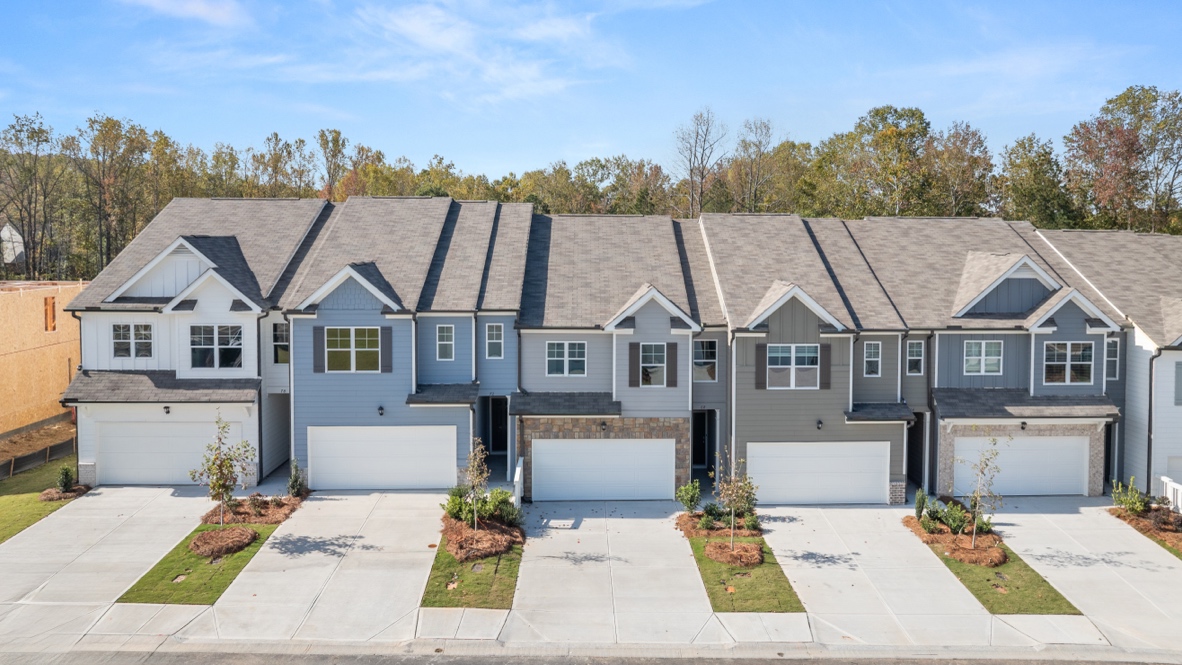 Exterior townhomes with stone detailing
