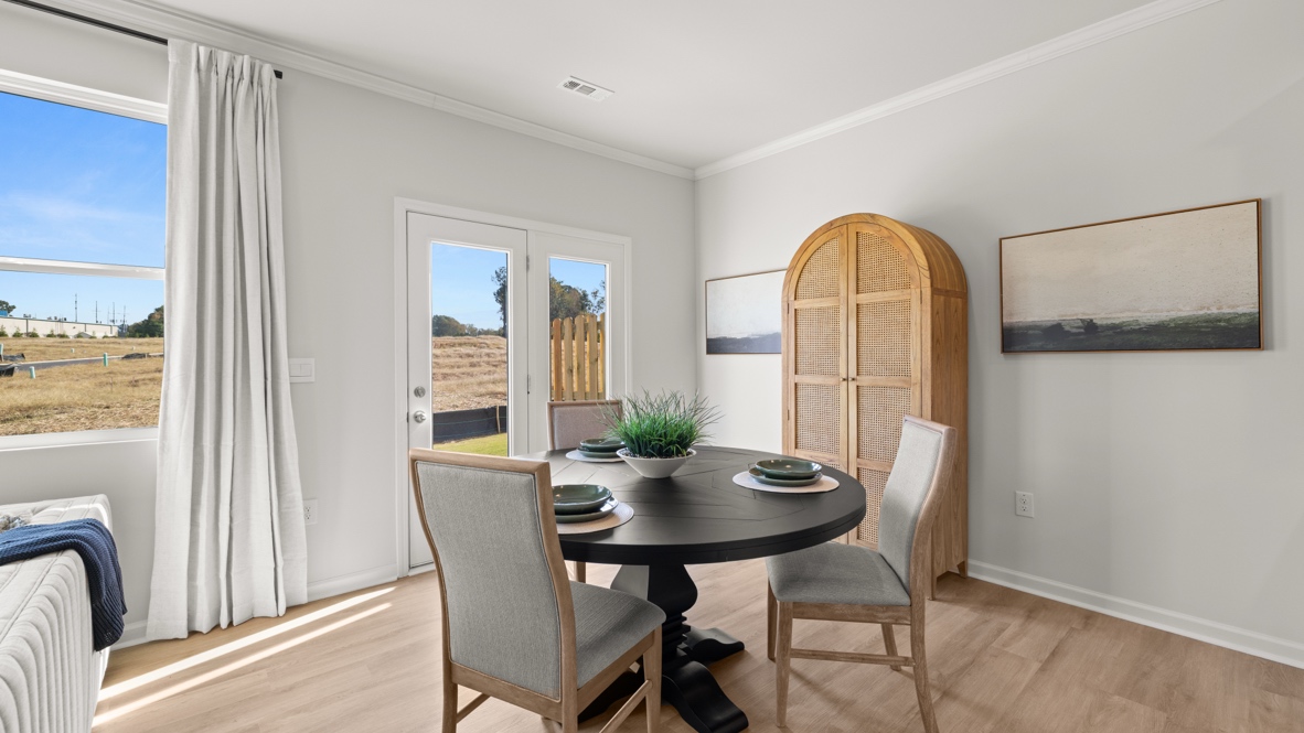 Interior dining area next to large windows