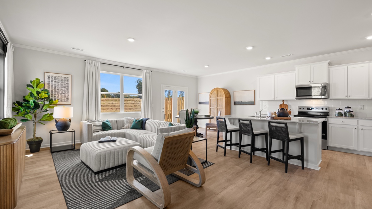 Interior living area open to kitchen with center island