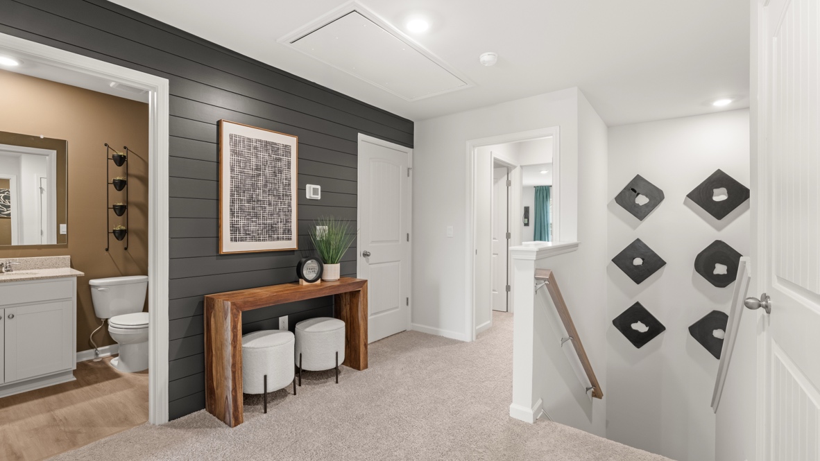 Interior upstairs loft area open to staircase