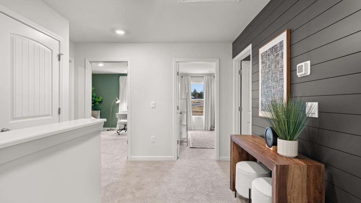 Interior upstairs loft area open to staircase