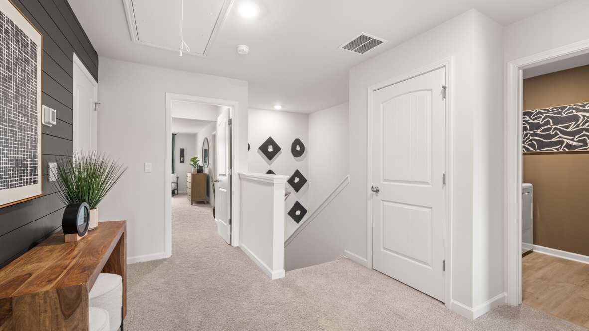 Interior upstairs loft area open to staircase