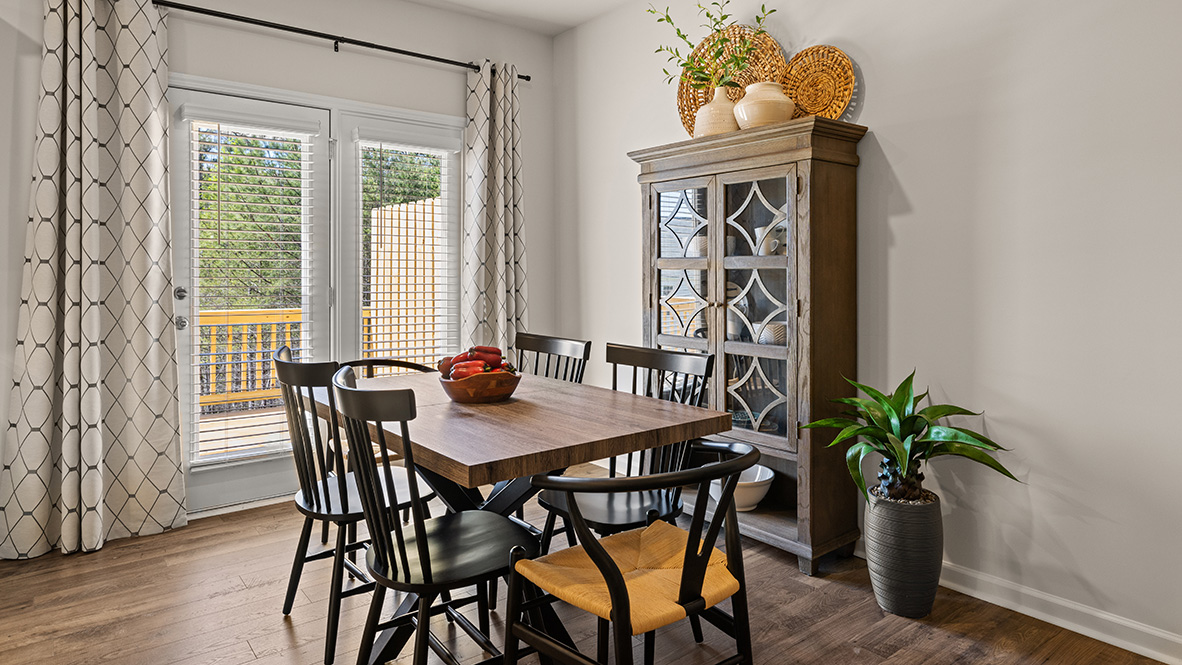 Interior dining area next to back patio doors