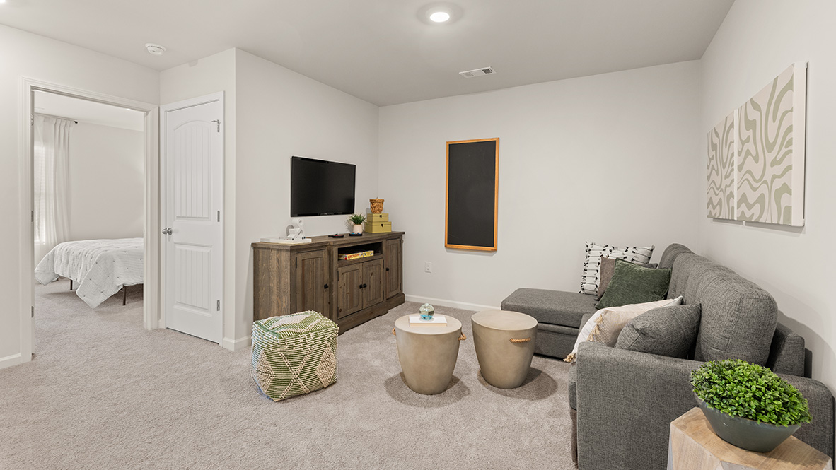 Interior upstairs loft area open to staircase