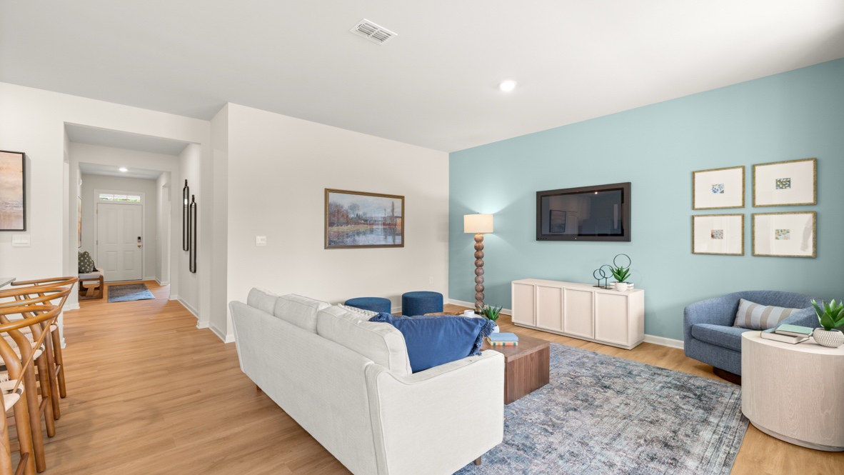 Interior living area with accent wall and large window