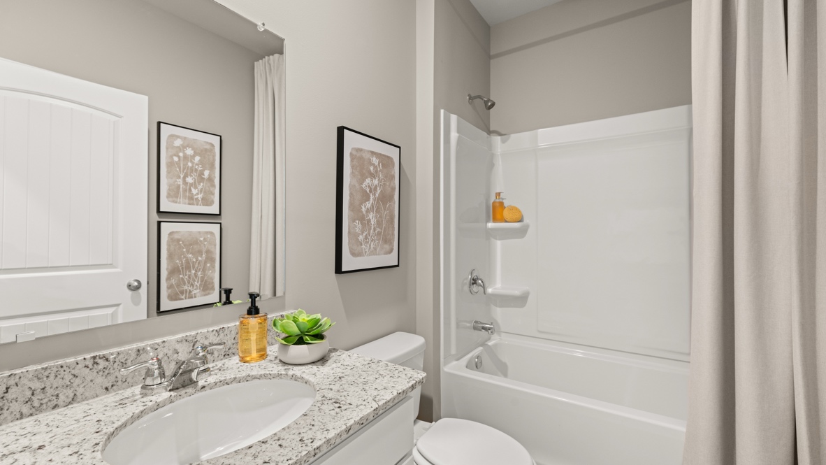 Interior bathroom with sink and full-sized shower