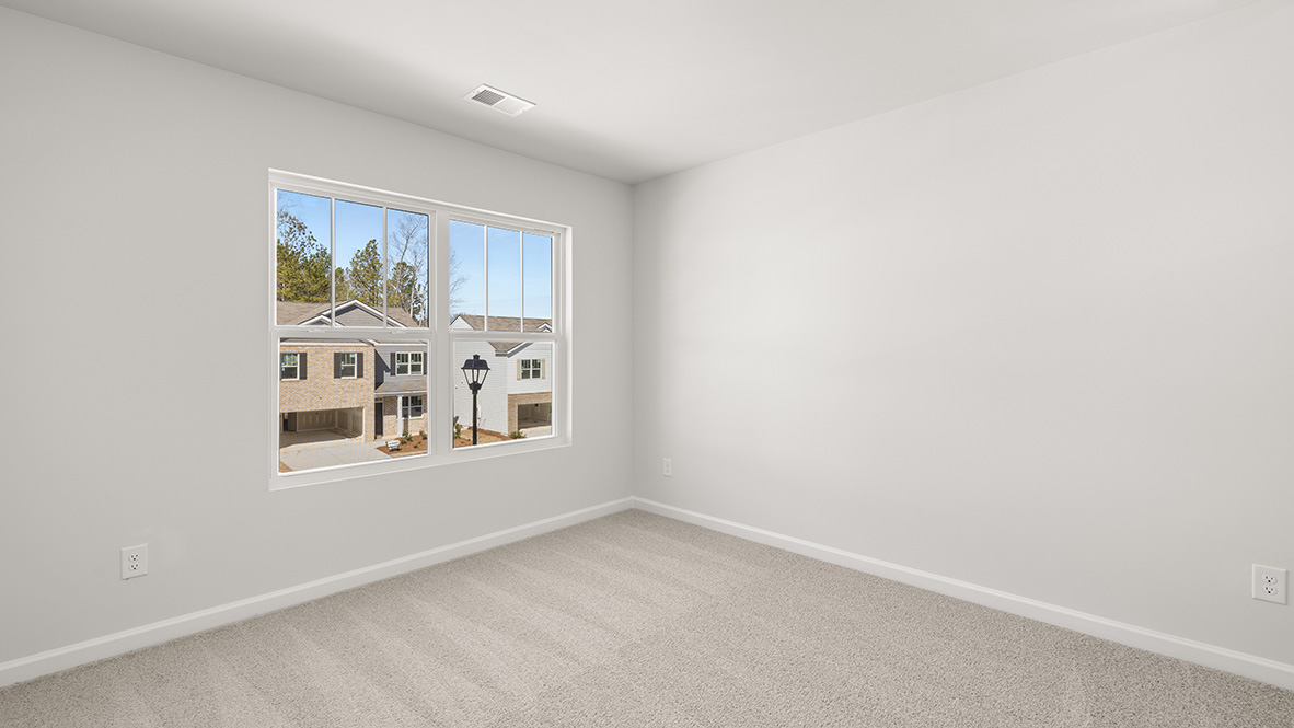 Interior bedroom with large window