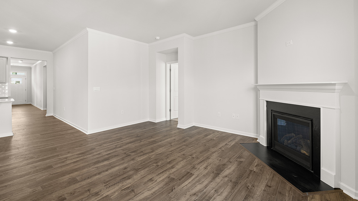 Interior living area with fire place and large window
