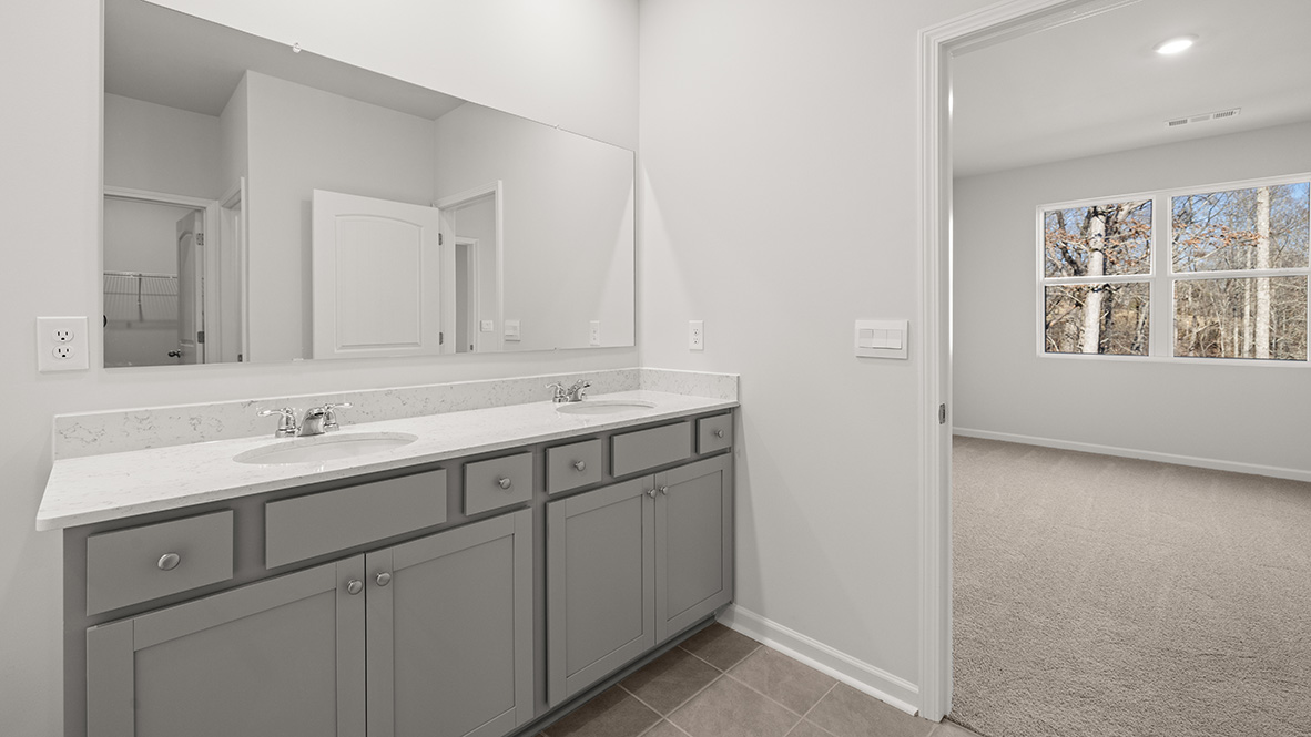 Interior primary bathroom with double sink