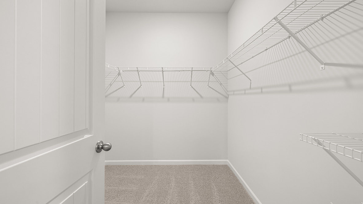 Interior primary walk-in closet