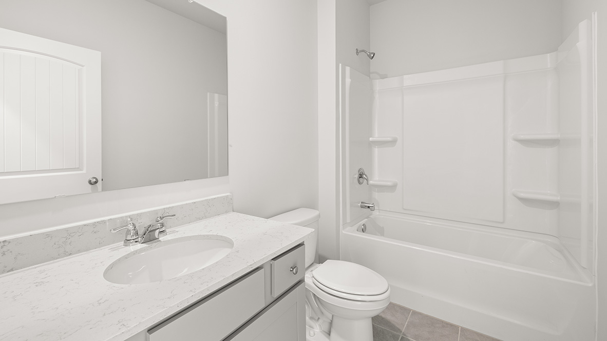 Interior bathroom with sink and full-sized shower