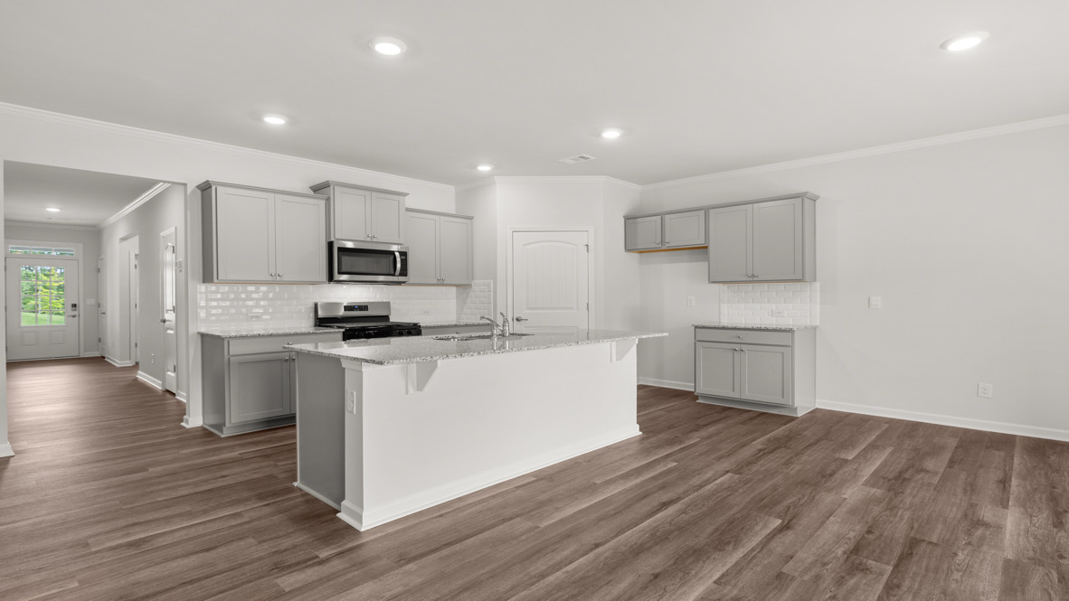 Interior kitchen with center island and light grey-cabinets