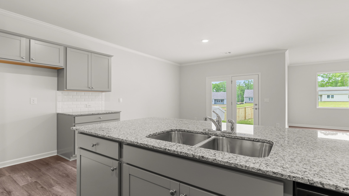 Interior kitchen with center island and light grey-cabinets