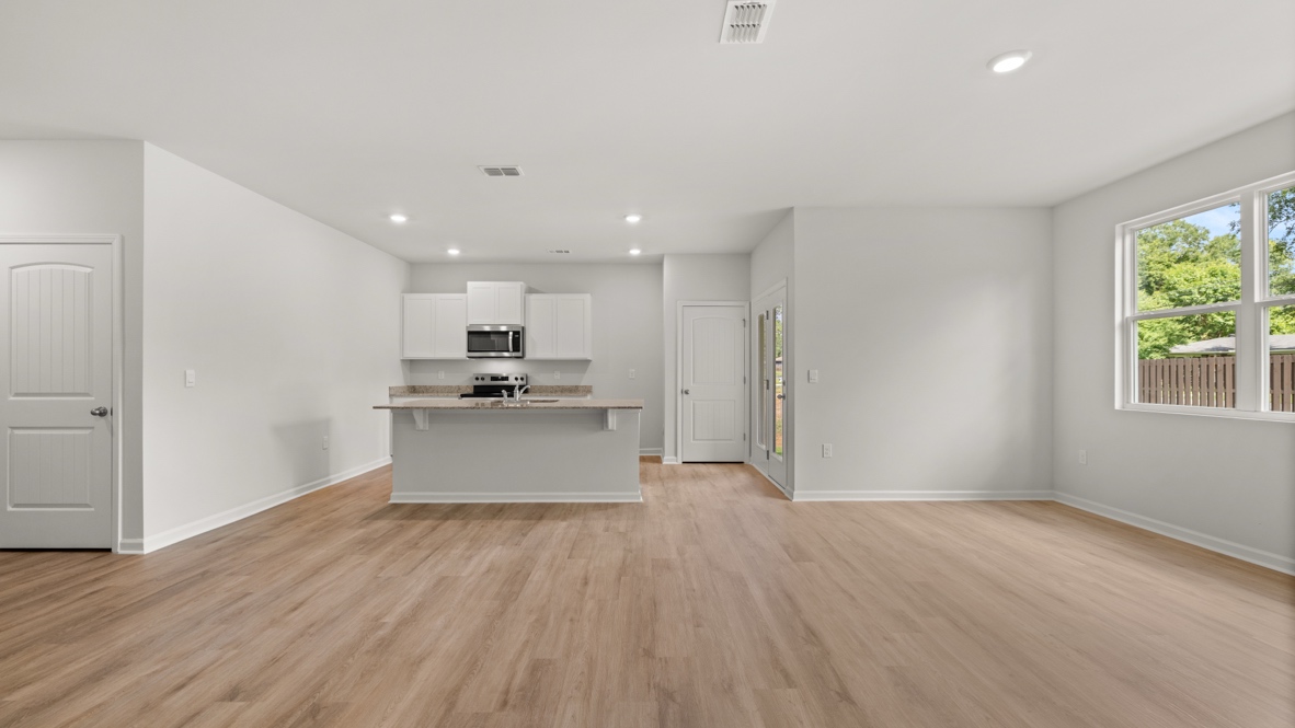 Interior living area open to kitchen with center island