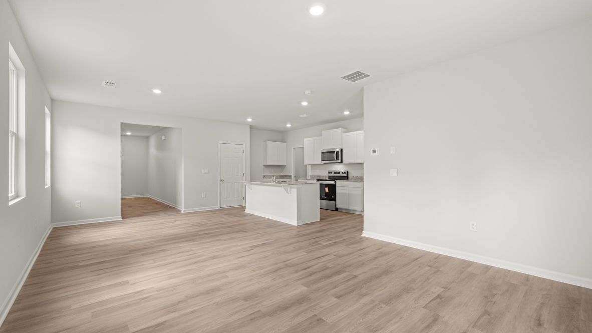 Interior living area open to kitchen with center island