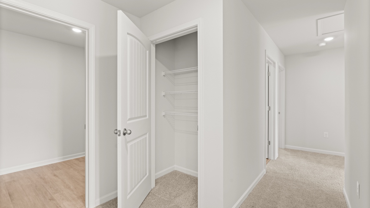 Interior hallway with hall closet