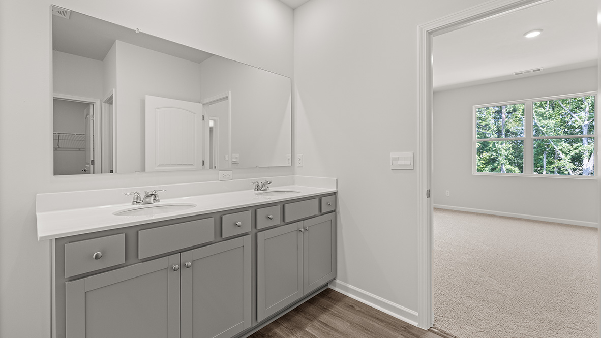 Interior primary bathroom with double sink