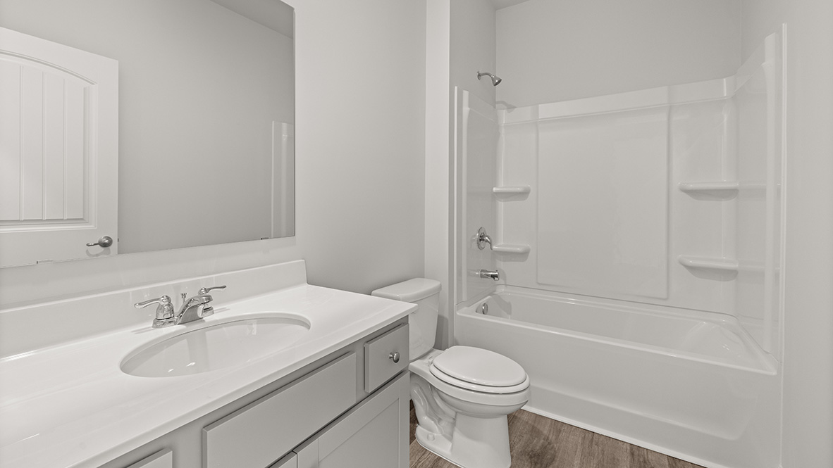 Interior bathroom with sink and full-sized shower